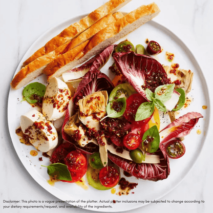 Plated salad with bread on a white background